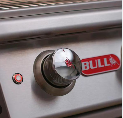 Close-up of the Brahma 38" 5-Burner Grill stainless steel control knob with Bull logo on heavy-duty grill cart.