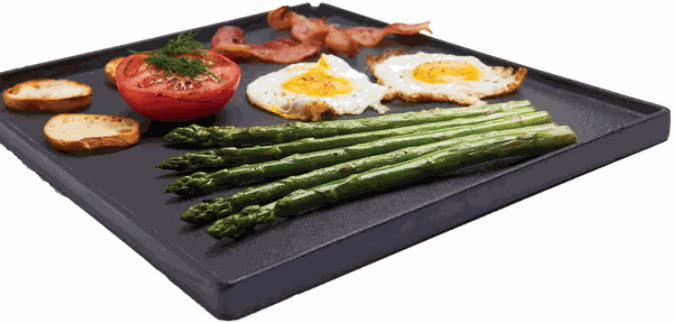 Broil King Signet 320 reversible cast iron griddle with grilled asparagus, eggs, bacon, tomato, and potatoes