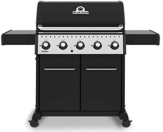 Broil King CROWN 520 professional-grade gas grill with five control knobs, black finish, side shelves, and storage cabinet.