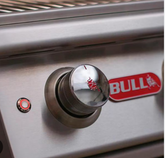 Close-up of the Brahma 38" 5-Burner Grill stainless steel control knob with Bull logo on heavy-duty grill cart.