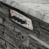 Blazing Beats Fire table control panel on stone base with granite top