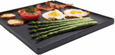 Broil King Signet 320 reversible cast iron griddle with grilled asparagus, eggs, bacon, tomato, and potatoes